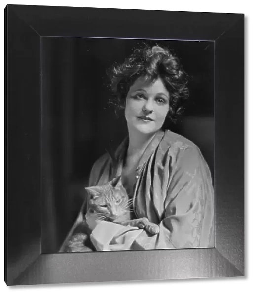 Pell, Miss, with Buzzer the cat, portrait photograph, 1916 Apr. 11. Creator: Arnold Genthe