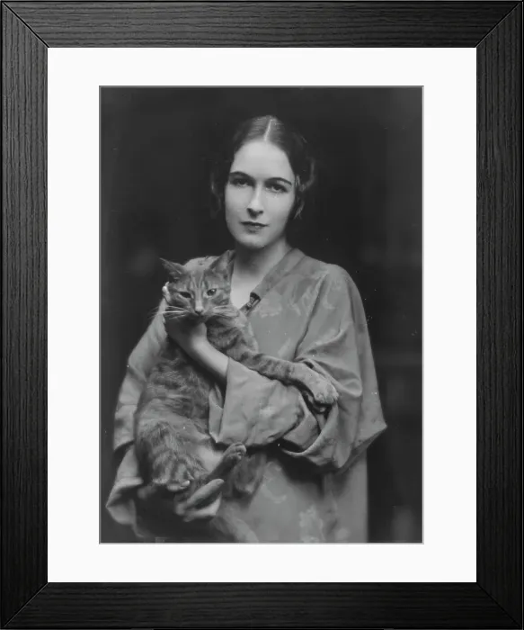 Framed Print : Pujo, Mona, Miss, with Buzzer the cat, portrait photograph, 1916. Creator: Arnold Genthe Framed Print : Pujo, Mona, Miss, with Buzzer the cat, portrait photograph, 1916. Creator: Arnold Genthe