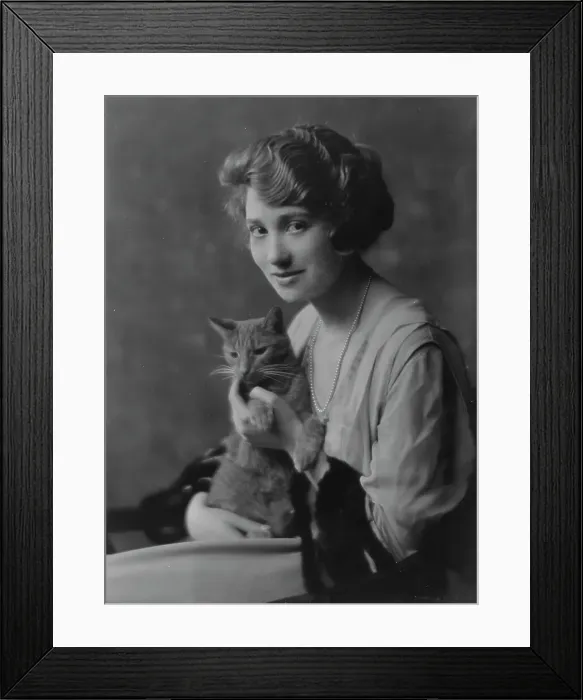 Framed Print : Bainter, Fay, Miss, with Buzzer the cat, portrait photograph, 1916. Creator: Arnold Genthe Framed Print : Bainter, Fay, Miss, with Buzzer the cat, portrait photograph, 1916. Creator: Arnold Genthe