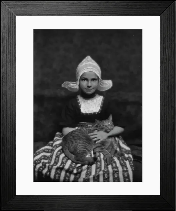Framed Print : Silvester child with Buzzer the cat, portrait photograph, 1913 Mar. 3. Creator: Arnold Genthe Framed Print : Silvester child with Buzzer the cat, portrait photograph, 1913 Mar. 3. Creator: Arnold Genthe