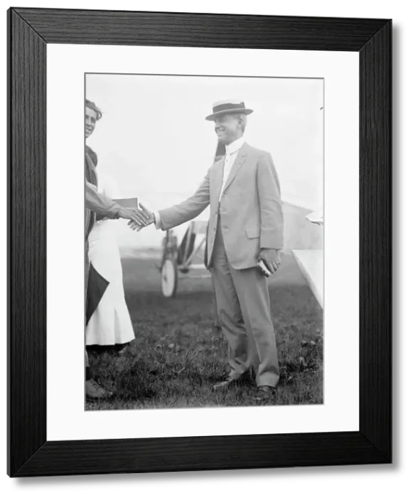 Framed Print : Maj. Edgar Russell, Signal Corps, U.S.A. Right, Shaking Hands with Aviator Wood, 1911. Creator: Harris & Ewing. Maj. Edgar Russell, Signal Corps, U.S.A. Right, Shaking Hands with Aviator Wood, 1911. Creator: Harris & Ewing Framed Print : Maj. Edgar Russell, Signal Corps, U.S.A. Right, Shaking Hands with Aviator Wood, 1911. Creator: Harris & Ewing. Maj. Edgar Russell, Signal Corps, U.S.A. Right, Shaking Hands with Aviator Wood, 1911. Creator: Harris & Ewing