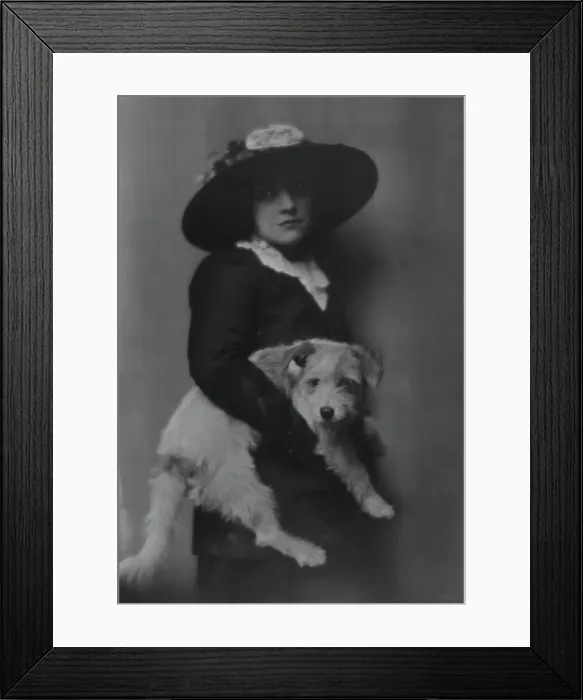 Framed Print : Taylor, Laurette, Miss, with dog, portrait photograph, 1913. Creator: Arnold Genthe Framed Print : Taylor, Laurette, Miss, with dog, portrait photograph, 1913. Creator: Arnold Genthe
