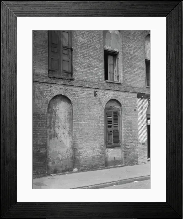Framed Print : Facade of a multi-story building, New Orleans or Charleston, South Carolina, between 1920 and 1926. Creator: Arnold Genthe Framed Print : Facade of a multi-story building, New Orleans or Charleston, South Carolina, between 1920 and 1926. Creator: Arnold Genthe