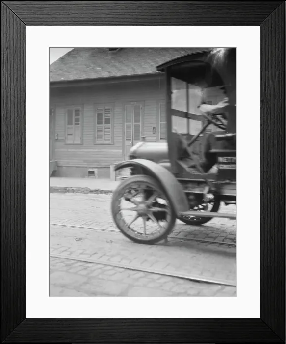 Framed Print : Car driving down a street, New Orleans or Charleston, South Carolina, between 1920 and 1926. Creator: Arnold Genthe Framed Print : Car driving down a street, New Orleans or Charleston, South Carolina, between 1920 and 1926. Creator: Arnold Genthe
