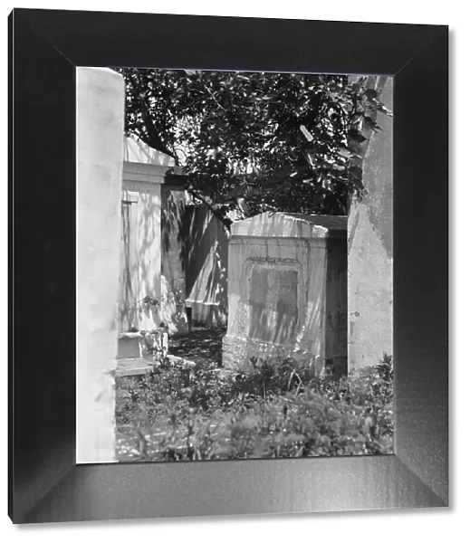 Tomb in St. Louis Cemetery, New Orleans, between 1920 and 1926. Creator: Arnold Genthe