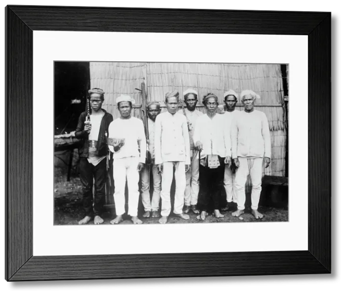 Framed Print : Philippines - Moro Datu And His Followers, 1913. Creator: Harris & Ewing. Philippines - Moro Datu And His Followers, 1913. Creator: Harris & Ewing Framed Print : Philippines - Moro Datu And His Followers, 1913. Creator: Harris & Ewing. Philippines - Moro Datu And His Followers, 1913. Creator: Harris & Ewing