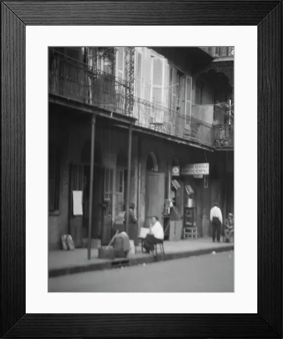 Framed Print : View from across street of people under a covered sidewalk, New Orleans, between 1920 and 1926. Creator: Arnold Genthe Framed Print : View from across street of people under a covered sidewalk, New Orleans, between 1920 and 1926. Creator: Arnold Genthe
