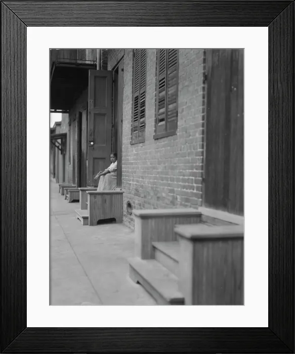 Framed Print : Woman sitting on steps, New Orleans or Charleston, South Carolina, between 1920 and 1926. Creator: Arnold Genthe Framed Print : Woman sitting on steps, New Orleans or Charleston, South Carolina, between 1920 and 1926. Creator: Arnold Genthe