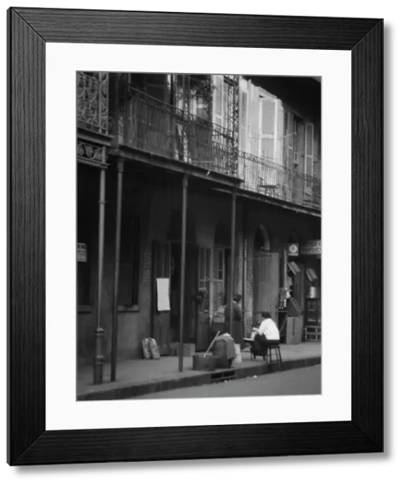 Framed Print : Women on a covered sidewalk, New Orleans, between 1920 and 1926. Creator: Arnold Genthe Framed Print : Women on a covered sidewalk, New Orleans, between 1920 and 1926. Creator: Arnold Genthe
