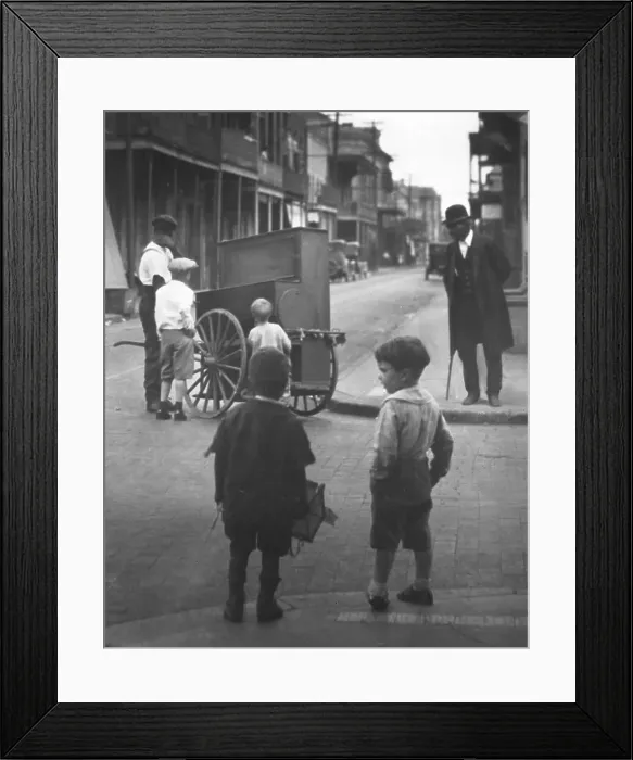 Framed Print : Organ grinder, New Orleans, between 1920 and 1926. Creator: Arnold Genthe Framed Print : Organ grinder, New Orleans, between 1920 and 1926. Creator: Arnold Genthe