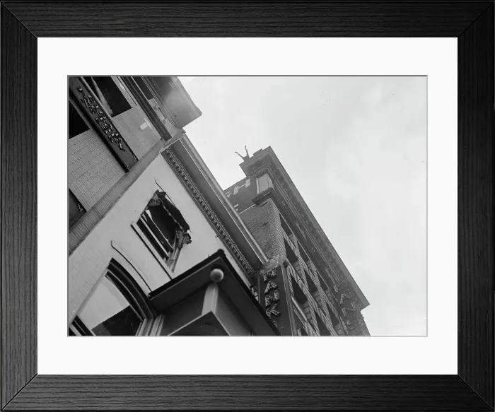 Framed Print : J. Reynolds, Performing Acrobatic And Balancing Acts On High Cornice Above 9th Street, N.W. 1917. Creator: Harris & Ewing. J. Reynolds, Performing Acrobatic And Balancing Acts On High Cornice Above 9th Street, N.W. 1917 Framed Print : J. Reynolds, Performing Acrobatic And Balancing Acts On High Cornice Above 9th Street, N.W. 1917. Creator: Harris & Ewing. J. Reynolds, Performing Acrobatic And Balancing Acts On High Cornice Above 9th Street, N.W. 1917