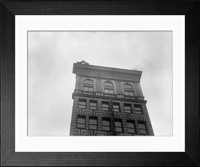 Framed Print : J. Reynolds, Performing Acrobatic And Balancing Acts On High Cornice Above 9th Street, N.W. 1917. Creator: Harris & Ewing. J. Reynolds, Performing Acrobatic And Balancing Acts On High Cornice Above 9th Street, N.W. 1917 Framed Print : J. Reynolds, Performing Acrobatic And Balancing Acts On High Cornice Above 9th Street, N.W. 1917. Creator: Harris & Ewing. J. Reynolds, Performing Acrobatic And Balancing Acts On High Cornice Above 9th Street, N.W. 1917