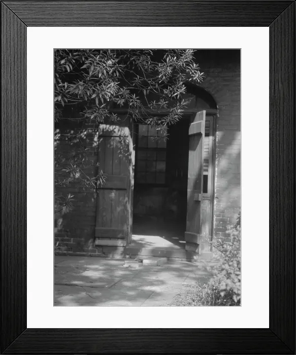 Framed Print : Courtyard, New Orleans, between 1920 and 1926. Creator: Arnold Genthe Framed Print : Courtyard, New Orleans, between 1920 and 1926. Creator: Arnold Genthe
