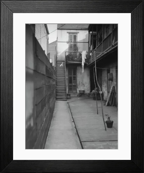 Framed Print : Courtyard, New Orleans, between 1920 and 1926. Creator: Arnold Genthe Framed Print : Courtyard, New Orleans, between 1920 and 1926. Creator: Arnold Genthe