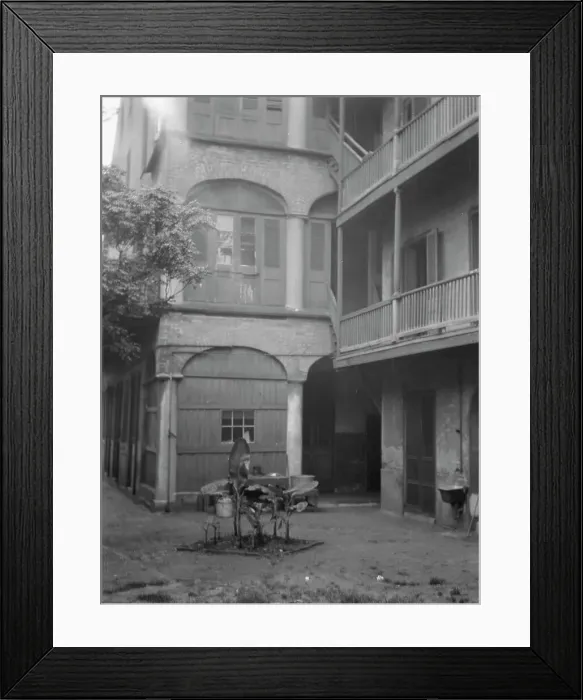 Framed Print : Courtyard, New Orleans, between 1920 and 1926. Creator: Arnold Genthe Framed Print : Courtyard, New Orleans, between 1920 and 1926. Creator: Arnold Genthe