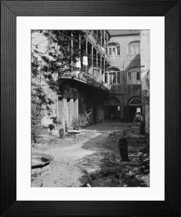 Framed Print : Courtyard, New Orleans, between 1920 and 1926. Creator: Arnold Genthe Framed Print : Courtyard, New Orleans, between 1920 and 1926. Creator: Arnold Genthe
