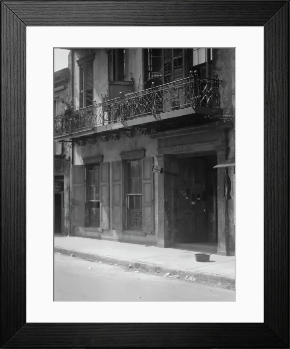 Framed Print : Facades of buildings along a street in the French Quarter, New Orleans, between 1920 and 1926. Creator: Arnold Genthe Framed Print : Facades of buildings along a street in the French Quarter, New Orleans, between 1920 and 1926. Creator: Arnold Genthe