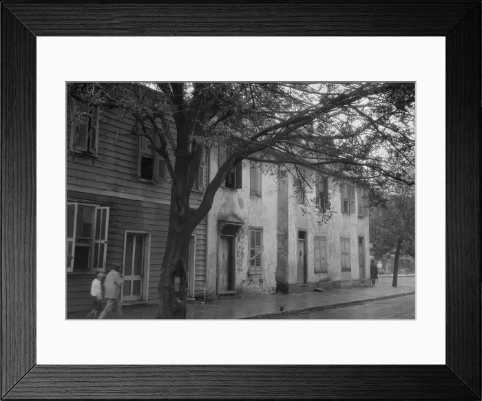 Framed Print : Facades of two-story houses, [Alexander Peronneau Tenements, 141 Church Street... c1920-1926. Creator: Arnold Genthe Framed Print : Facades of two-story houses, [Alexander Peronneau Tenements, 141 Church Street... c1920-1926. Creator: Arnold Genthe