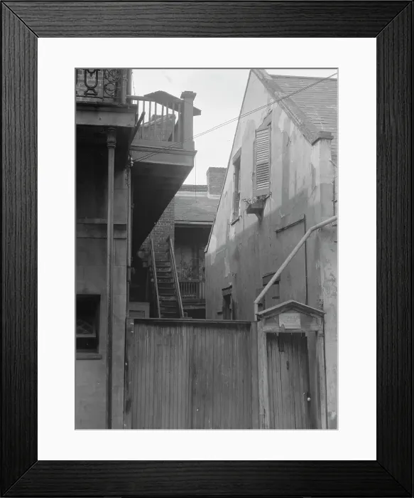 Framed Print : Houses in the French Quarter, New Orleans, between 1920 and 1926. Creator: Arnold Genthe Framed Print : Houses in the French Quarter, New Orleans, between 1920 and 1926. Creator: Arnold Genthe