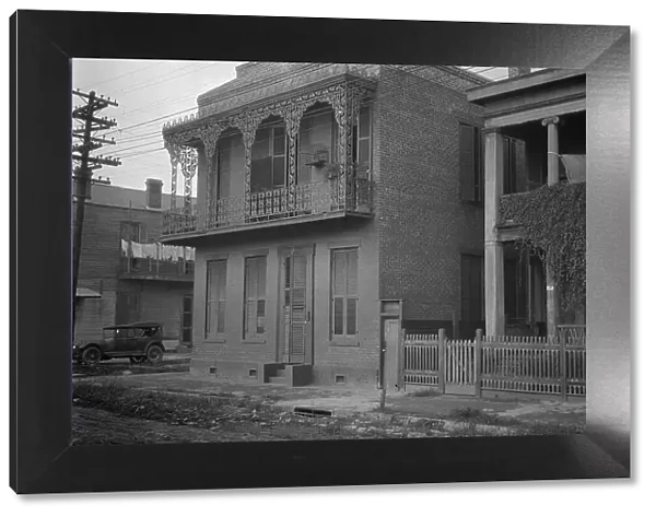 Two-story houses, New Orleans, between 1920 and 1926. Creator: Arnold Genthe