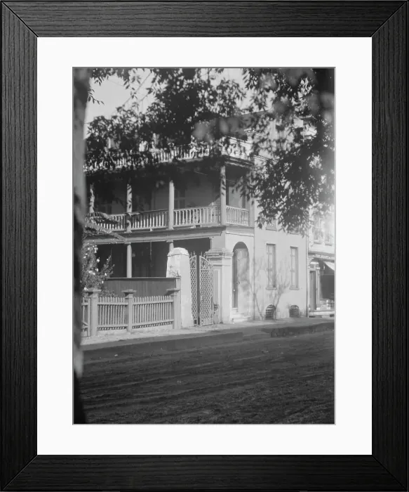 Framed Print : View from across street of a multi-story house, [25 Franklin Street], Charleston... c1920-1926. Creator: Arnold Genthe