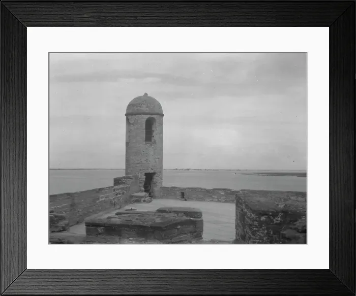 Framed Print : Walls and round tower by the water, Castillo de San Marcos, St. Augustine, Florida, c1920-c1926. Creator: Arnold Genthe Framed Print : Walls and round tower by the water, Castillo de San Marcos, St. Augustine, Florida, c1920-c1926. Creator: Arnold Genthe