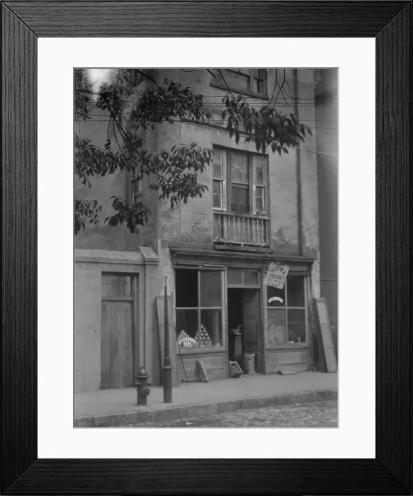 Framed Print : Facade of a grocery store, New Orleans or Charleston, South Carolina, between 1920 and 1926. Creator: Arnold Genthe Framed Print : Facade of a grocery store, New Orleans or Charleston, South Carolina, between 1920 and 1926. Creator: Arnold Genthe