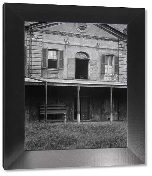 Rear wall of the old Ursuline convent, New Orleans, between 1920 and 1926. Creator: Arnold Genthe