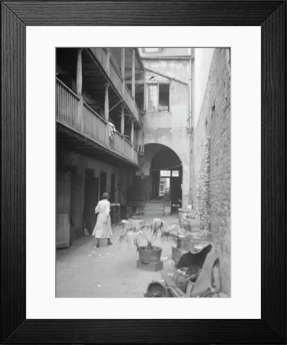 Framed Print : Courtyard, New Orleans, between 1920 and 1926. Creator: Arnold Genthe Framed Print : Courtyard, New Orleans, between 1920 and 1926. Creator: Arnold Genthe