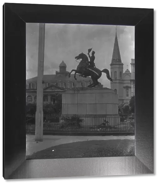 Jackson monument in Jackson Square with the Cabildo and St. Louis Cathedral, New Orleans, c1920-26. Creator: Arnold Genthe