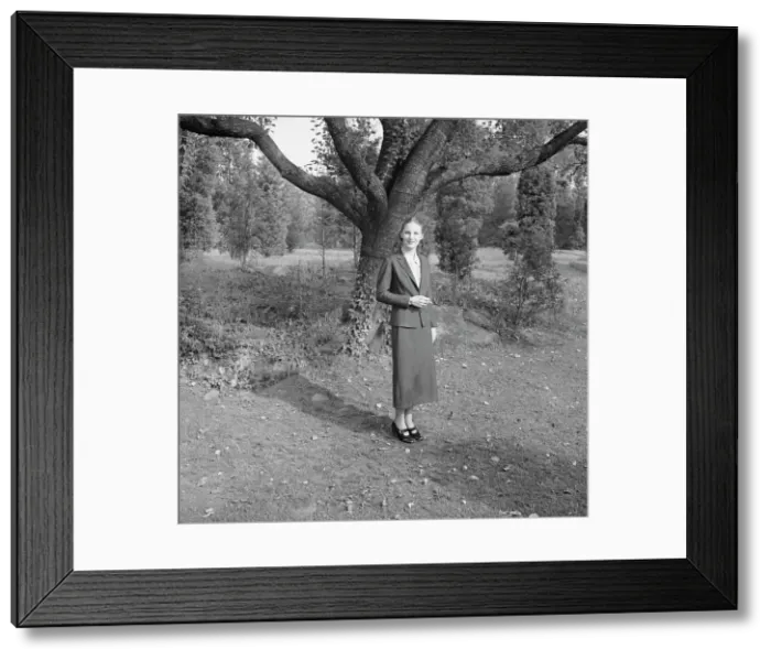 Framed Print : Ruth, standing outdoors by a tree, 1936 Creator: Arnold Genthe Framed Print : Ruth, standing outdoors by a tree, 1936 Creator: Arnold Genthe