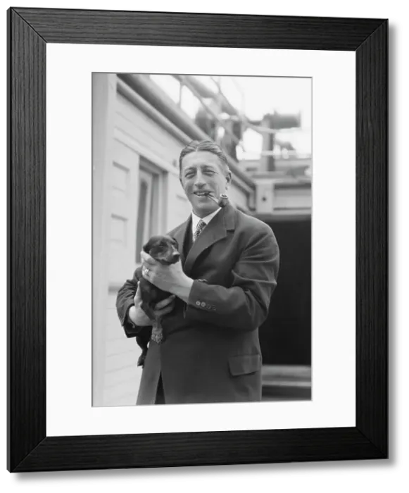 Framed Print : Von Lueckner, Felix, Count, with dog, standing outdoors, 1931 June 5. Creator: Arnold Genthe Framed Print : Von Lueckner, Felix, Count, with dog, standing outdoors, 1931 June 5. Creator: Arnold Genthe