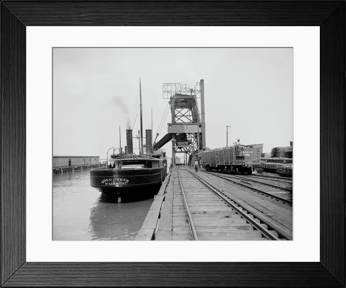Framed Print : Dumping a car, Ellsworth coal chutes, Cleveland, ca 1900. Creator: Unknown