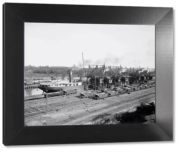 Unloading ore at Conneaut, Ohio, Brown conveying hoists, ca 1900. Creator: Unknown