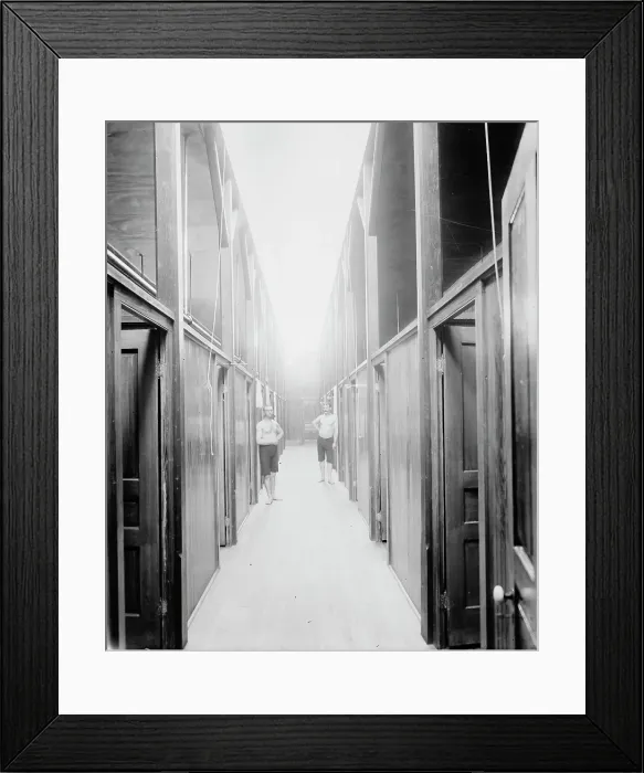 Framed Print : Two men in corridor, probably the Ypsilanti mineral bath house, Ypsilanti, Michigan, c1900-1910. Creator: Unknown Framed Print : Two men in corridor, probably the Ypsilanti mineral bath house, Ypsilanti, Michigan, c1900-1910. Creator: Unknown