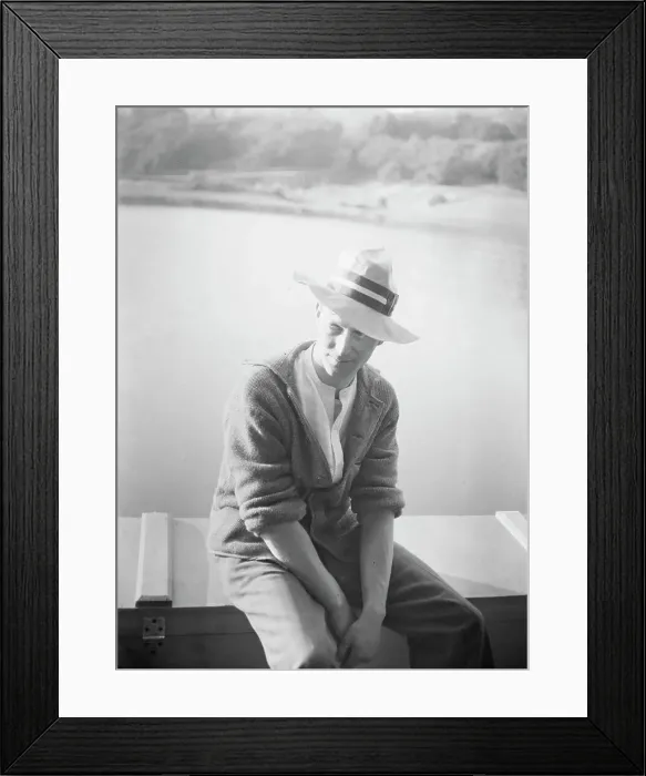 Framed Print : Unidentified man, seated in front of water, between 1896 and 1942. Creator: Arnold Genthe Framed Print : Unidentified man, seated in front of water, between 1896 and 1942. Creator: Arnold Genthe