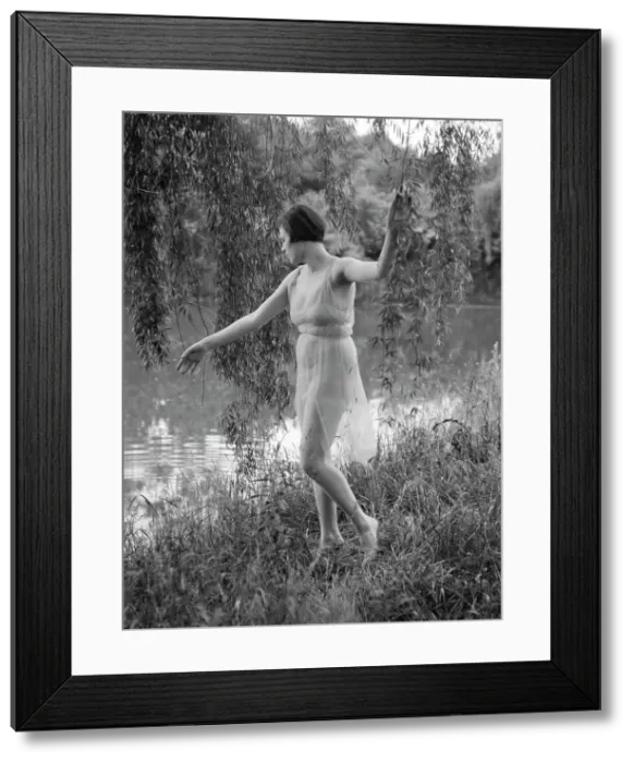 Framed Print : Unidentified dancer, possibly an Elizabeth Duncan dancer, between 1911 and 1942. Creator: Arnold Genthe Framed Print : Unidentified dancer, possibly an Elizabeth Duncan dancer, between 1911 and 1942. Creator: Arnold Genthe