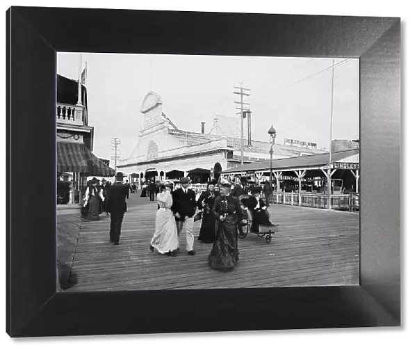 Young's pier & boardwalk, Atlantic City, N.J. between 1895 and 1910. Creator: Unknown. Young's pier & boardwalk, Atlantic City, N.J. between 1895 and 1910. Creator: Unknown