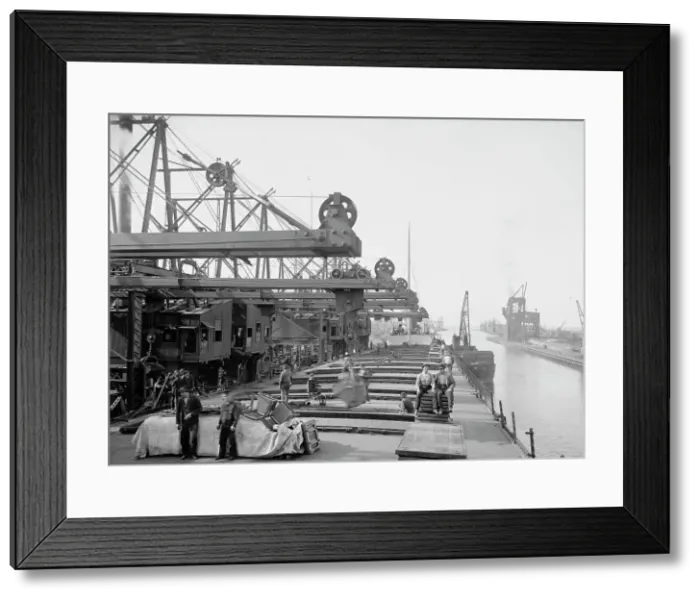 Framed Print : Unloading ore at Conneaut, Ohio, Brown conveying hoists, between 1900 and 1906. Creator: Unknown Framed Print : Unloading ore at Conneaut, Ohio, Brown conveying hoists, between 1900 and 1906. Creator: Unknown