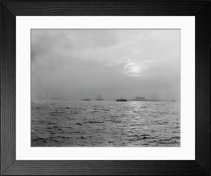 Framed Print : Sunset off the Battery, New York harbor, ca 1900. Creator: Unknown Framed Print : Sunset off the Battery, New York harbor, ca 1900. Creator: Unknown