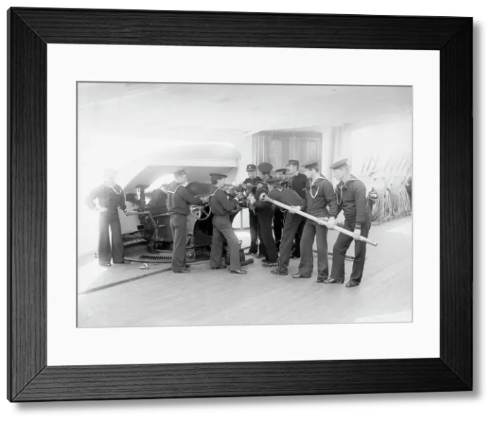 Framed Print : U.S.S. Newark, loading 6-inch gun, between 1891 and 1901. Creator: Unknown Framed Print : U.S.S. Newark, loading 6-inch gun, between 1891 and 1901. Creator: Unknown