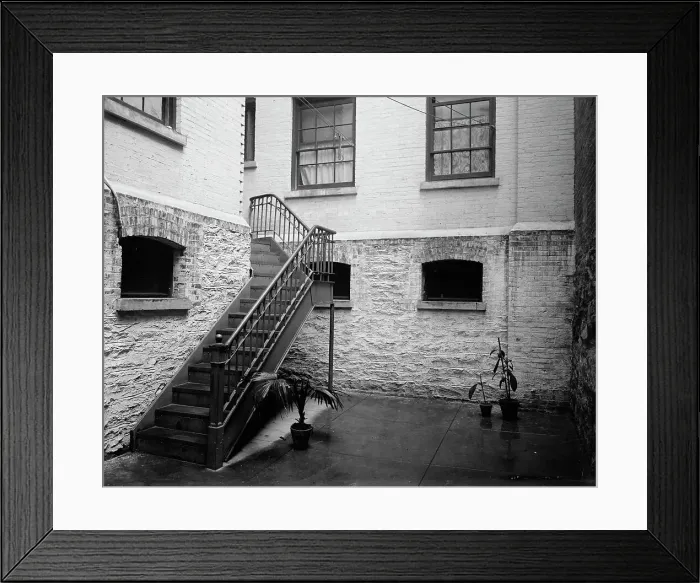 Framed Print : Court of tenement house, New York City, between 1900 and 1910. Creator: Unknown Framed Print : Court of tenement house, New York City, between 1900 and 1910. Creator: Unknown