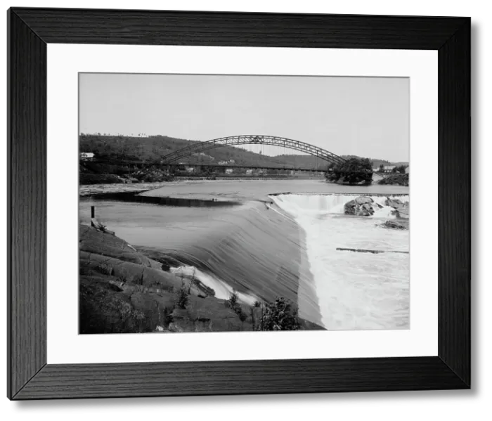Framed Print : Falls and Arch bridge, Bellows Falls, Vt. between 1905 and 1910. Creator: Unknown Framed Print : Falls and Arch bridge, Bellows Falls, Vt. between 1905 and 1910. Creator: Unknown