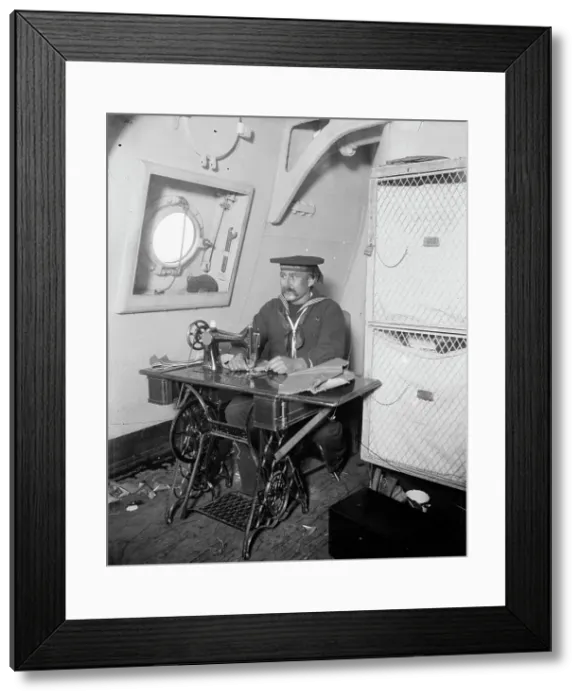 Framed Print : U.S.S. Brooklyn, ship's tailor, between 1896 and 1899. Creator: Unknown Framed Print : U.S.S. Brooklyn, ship's tailor, between 1896 and 1899. Creator: Unknown