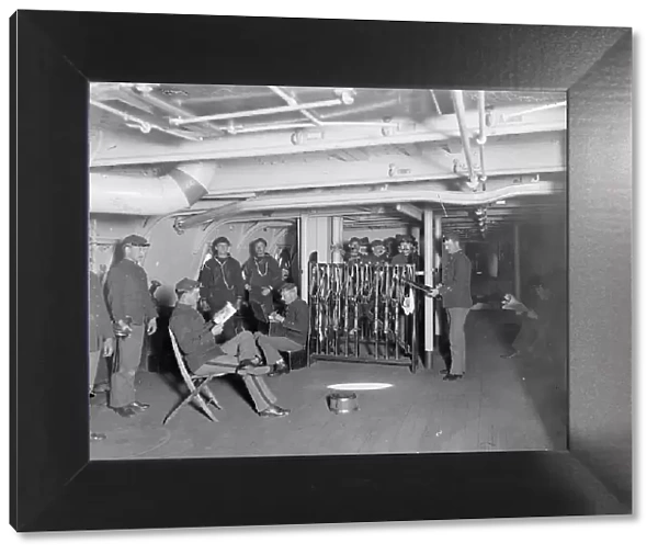 U.S.S. Brooklyn, group on gun deck, between 1896 and 1899. Creator: Unknown