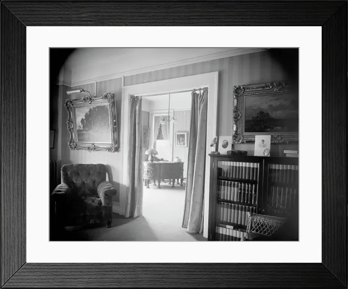 Framed Print : Room with bookcase, study with desk, between 1900 and 1915. Creator: Unknown Framed Print : Room with bookcase, study with desk, between 1900 and 1915. Creator: Unknown