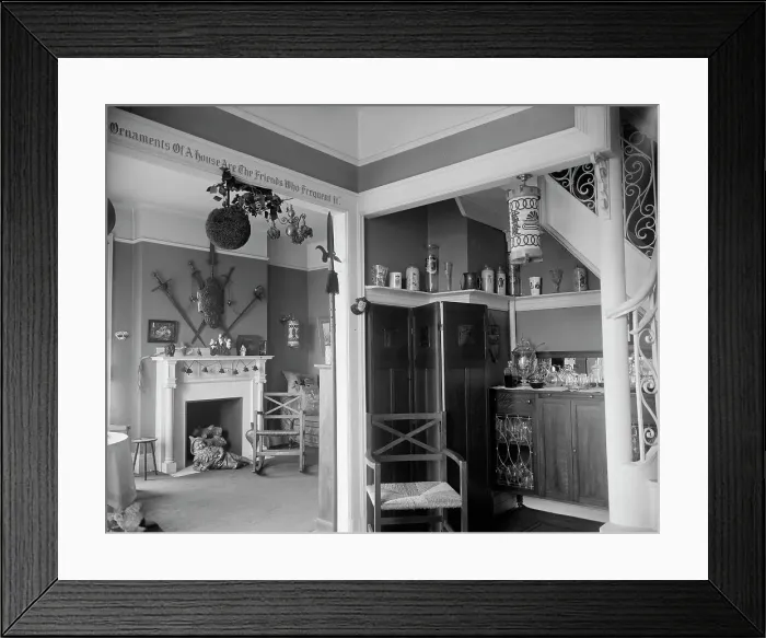 Framed Print : Hallway with liquor cabinet and living room decorated with mistletoe ball and Christm... c1900-1915 Creator: Unknown Framed Print : Hallway with liquor cabinet and living room decorated with mistletoe ball and Christm... c1900-1915 Creator: Unknown