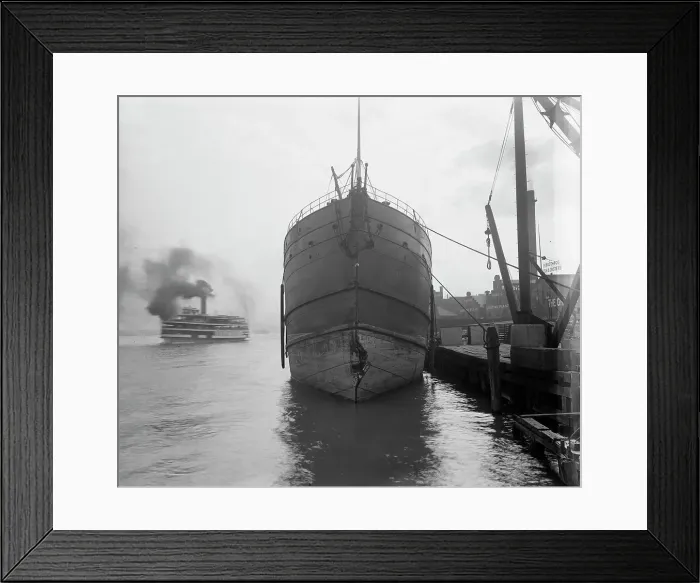 Framed Print : Unidentified freighter, Detroit, Michigan, with passenger steamer Britannia... c1906-1915. Creator: Unknown Framed Print : Unidentified freighter, Detroit, Michigan, with passenger steamer Britannia... c1906-1915. Creator: Unknown