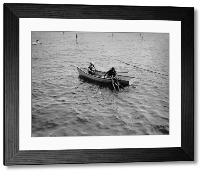 Framed Print : Saving a life, between 1900 and 1905. Creator: Unknown Framed Print : Saving a life, between 1900 and 1905. Creator: Unknown