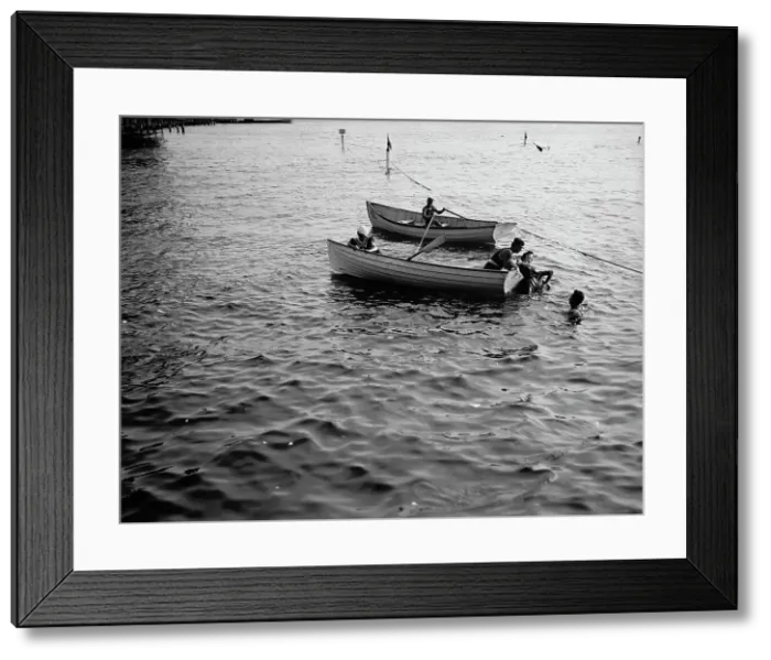 Framed Print : Saving a life, between 1900 and 1905. Creator: Unknown Framed Print : Saving a life, between 1900 and 1905. Creator: Unknown
